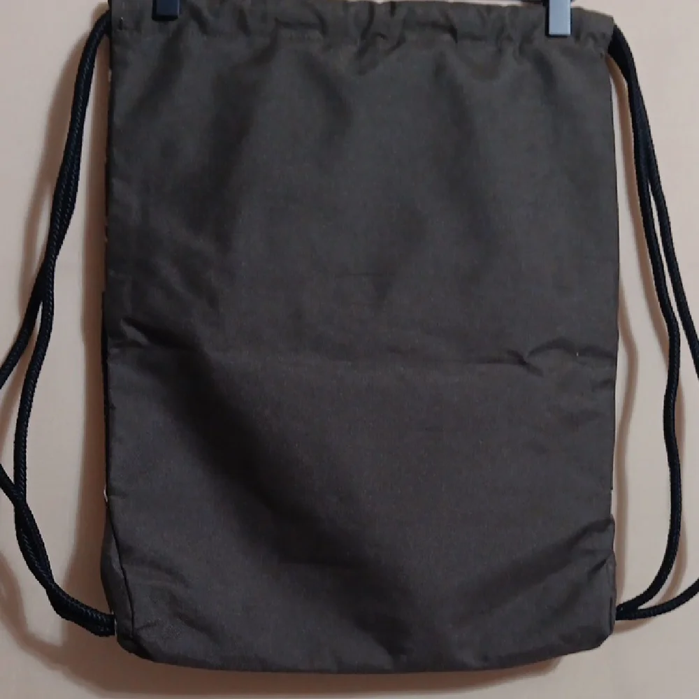 Brown Backpack with Drawstring Closure